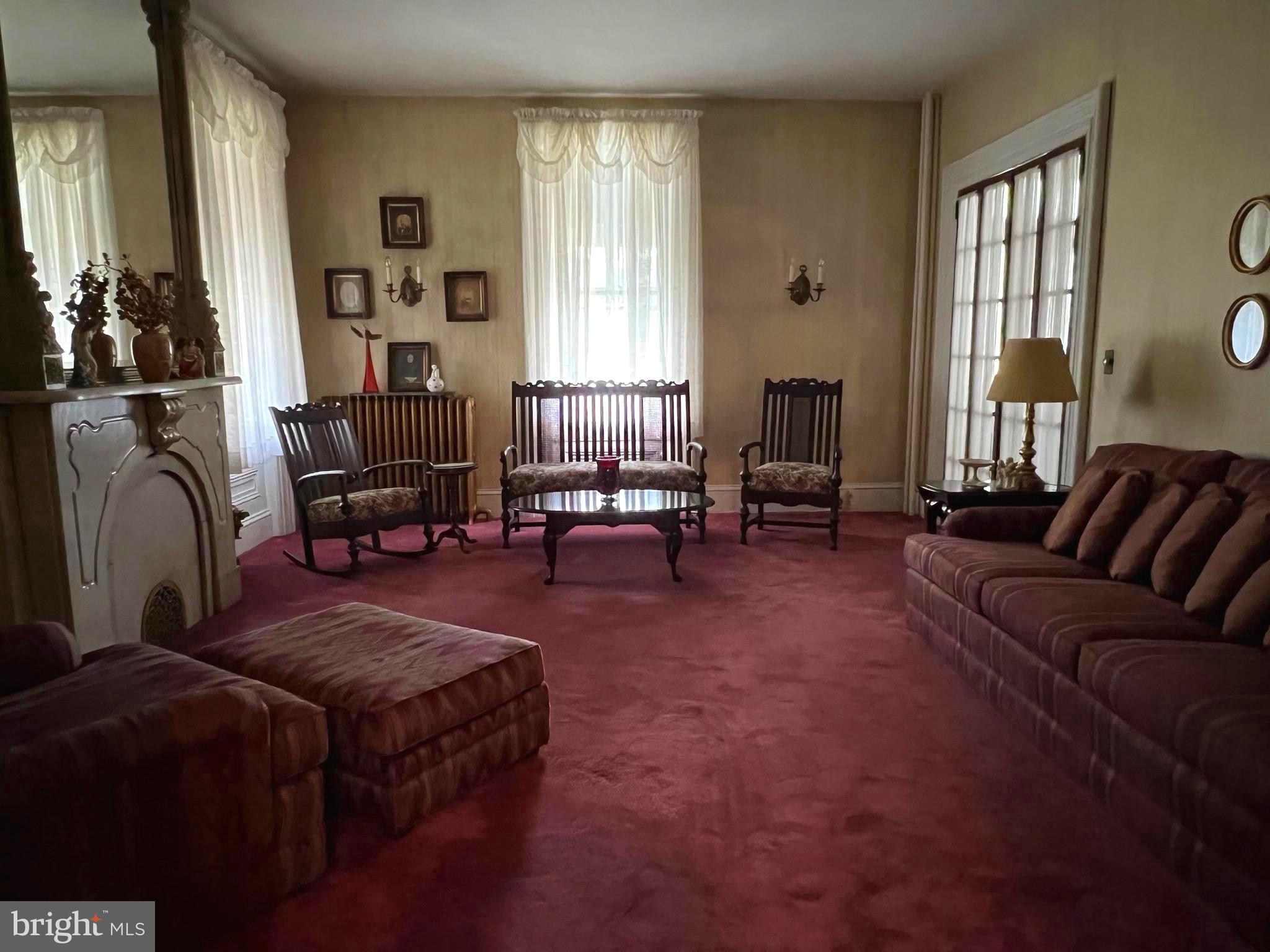 424 Jennings Street Beverly, NJ 08010 - Photo 7 of 43 a living room with furniture and a window