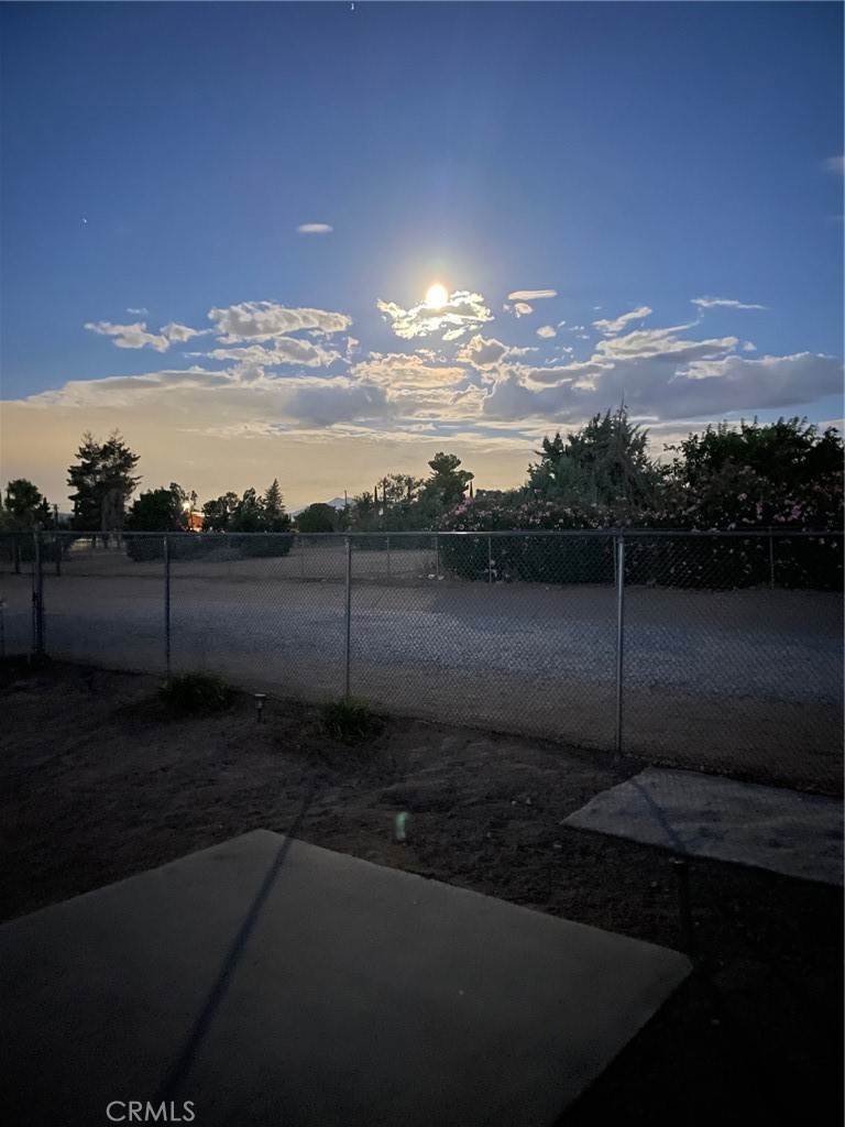 14961 Walnut Street Hesperia, CA 92345 - Photo 17 of 25 a view of a yard with wooden floor