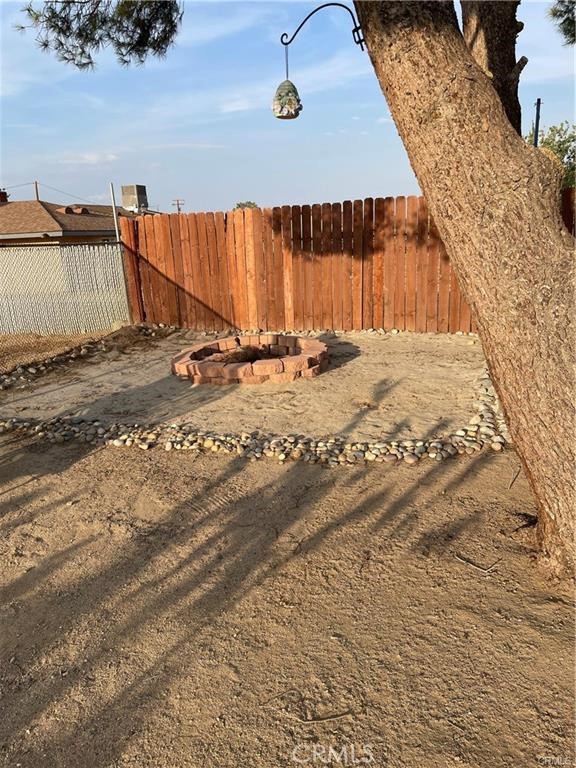 14961 Walnut Street Hesperia, CA 92345 - Photo 22 of 25 a view of a backyard of the house