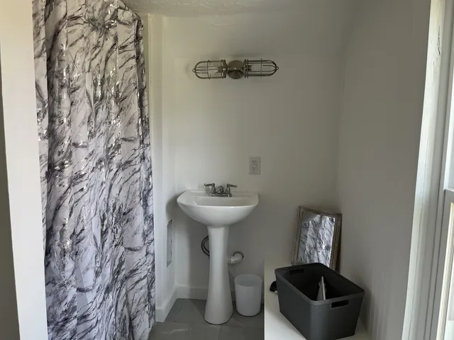 a bathroom with a sink and a toilet