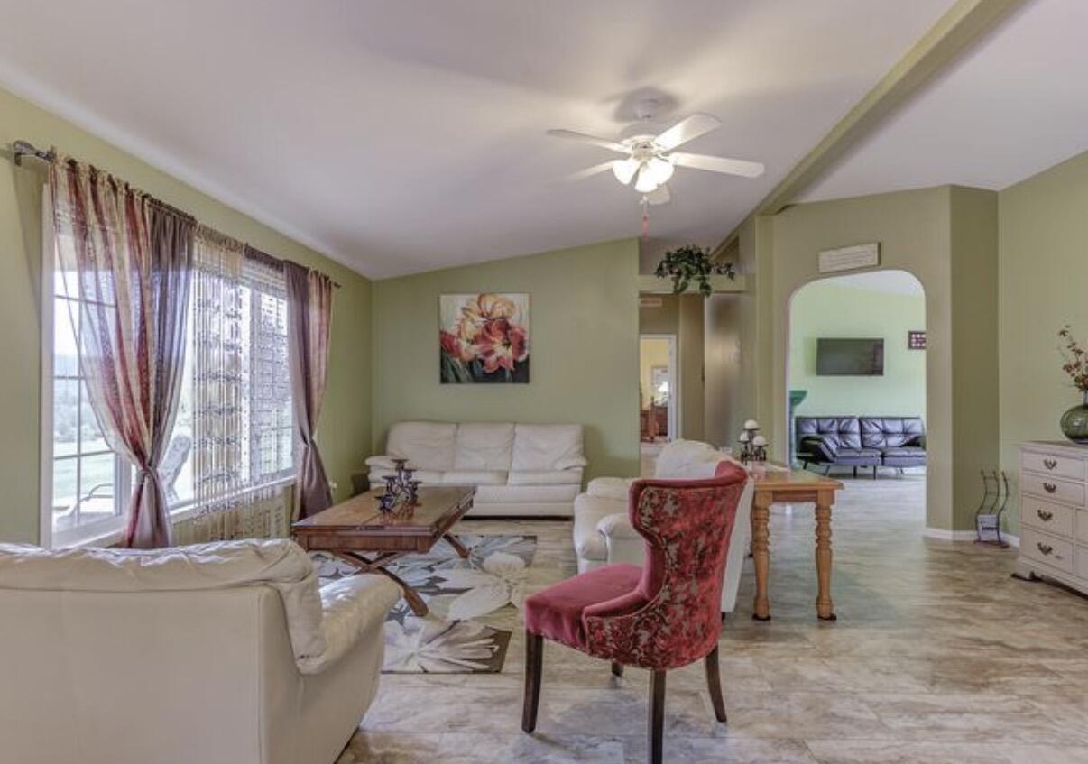 1537 Lewiston Road Lewiston, CA 96052 - Photo 3 of 6 a living room with furniture and a large window