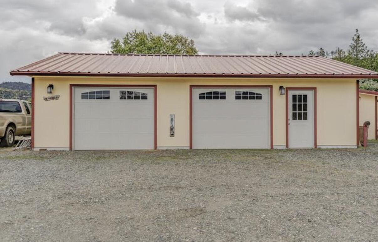 1537 Lewiston Road Lewiston, CA 96052 - Photo 5 of 6 a view of a white house with a yard