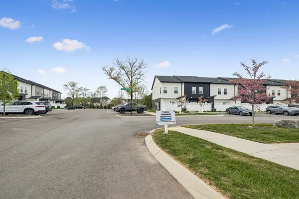 a view of a street with houses