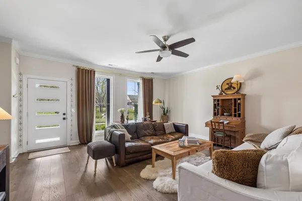 a living room with furniture and a window