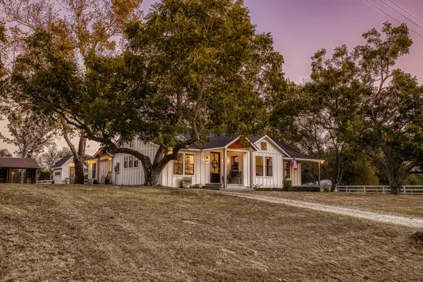 front view of a house with a dry yard