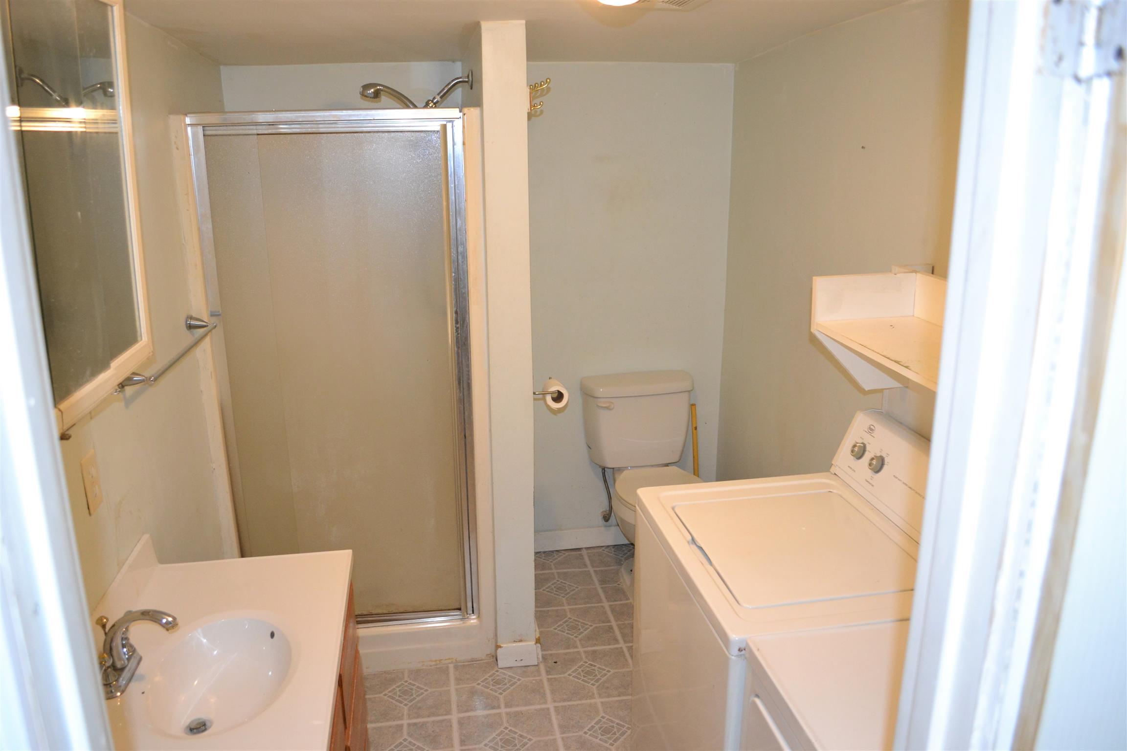 9699 Chestnut Ridge Road Lynchburg, TN 37352 - Photo 9 of 11 a utility room with dryer and washer