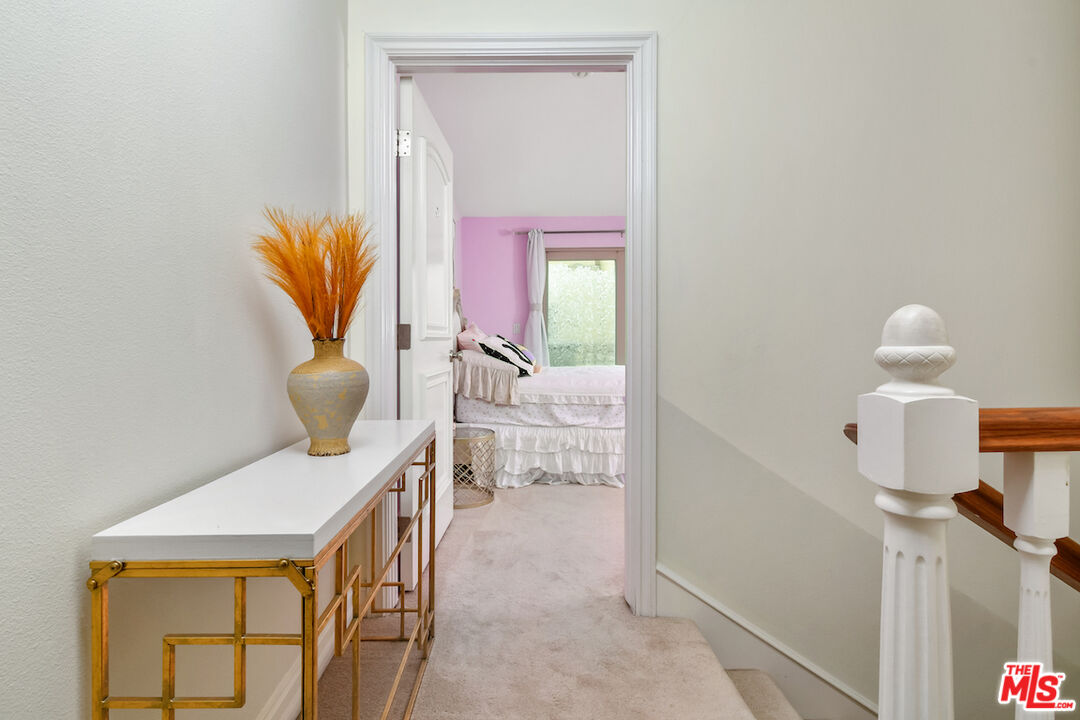 15248 Clark Street, Unit 104 Sherman Oaks, CA 91411 - Photo 28 of 48 a living room with furniture and a window