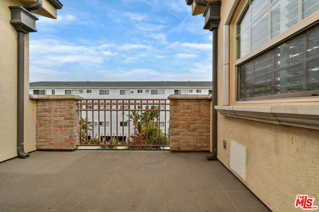15248 Clark Street, Unit 104 Sherman Oaks, CA 91411 - Photo 46 of 48 a view of a building with a street