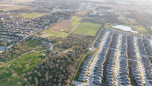 an aerial view of beach and ocean