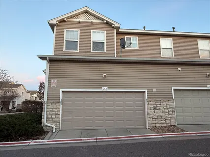 a front view of a house with a garage