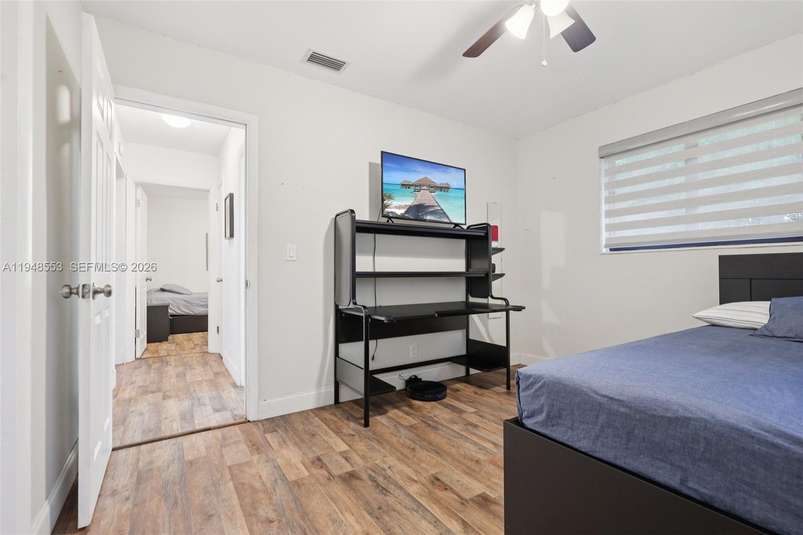 5301 Pierce Street Hollywood, FL 33021 - Photo 20 of 45 a bedroom with a bed and a cabinets