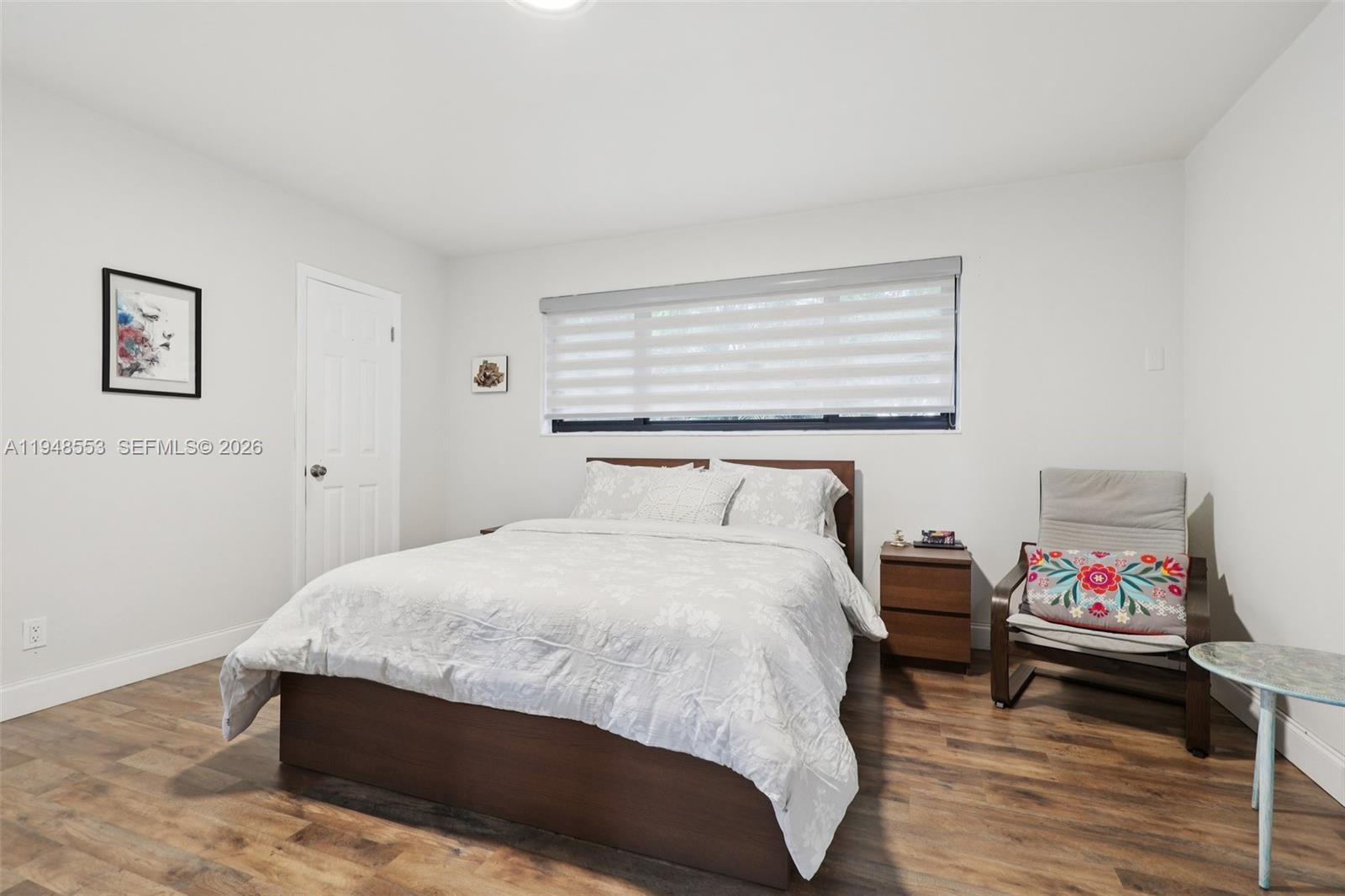 5301 Pierce Street Hollywood, FL 33021 - Photo 25 of 45 a bedroom with a bed and a desk