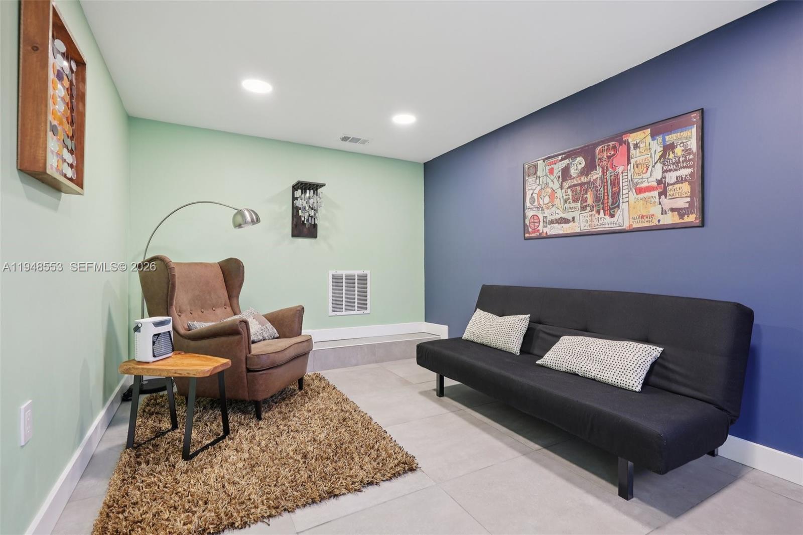 5301 Pierce Street Hollywood, FL 33021 - Photo 35 of 45 a living room with furniture and rug