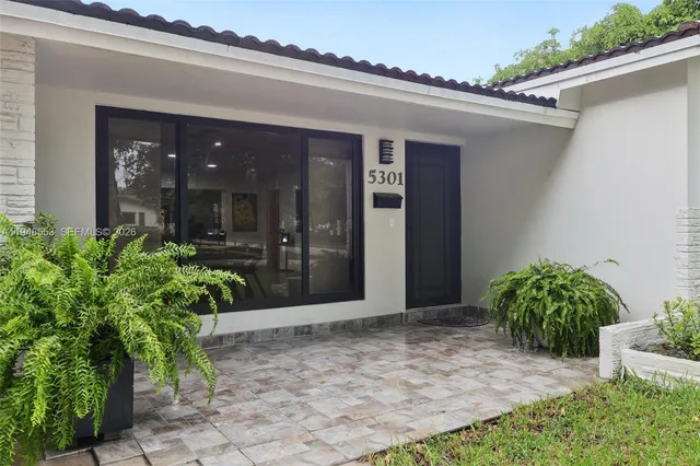 a view of a porch with a bench