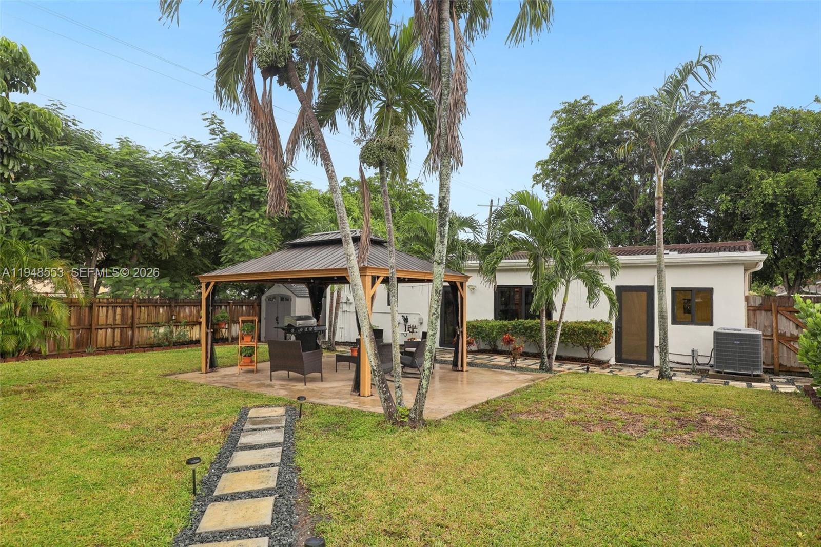 5301 Pierce Street Hollywood, FL 33021 - Photo 43 of 45 a view of a building with a patio