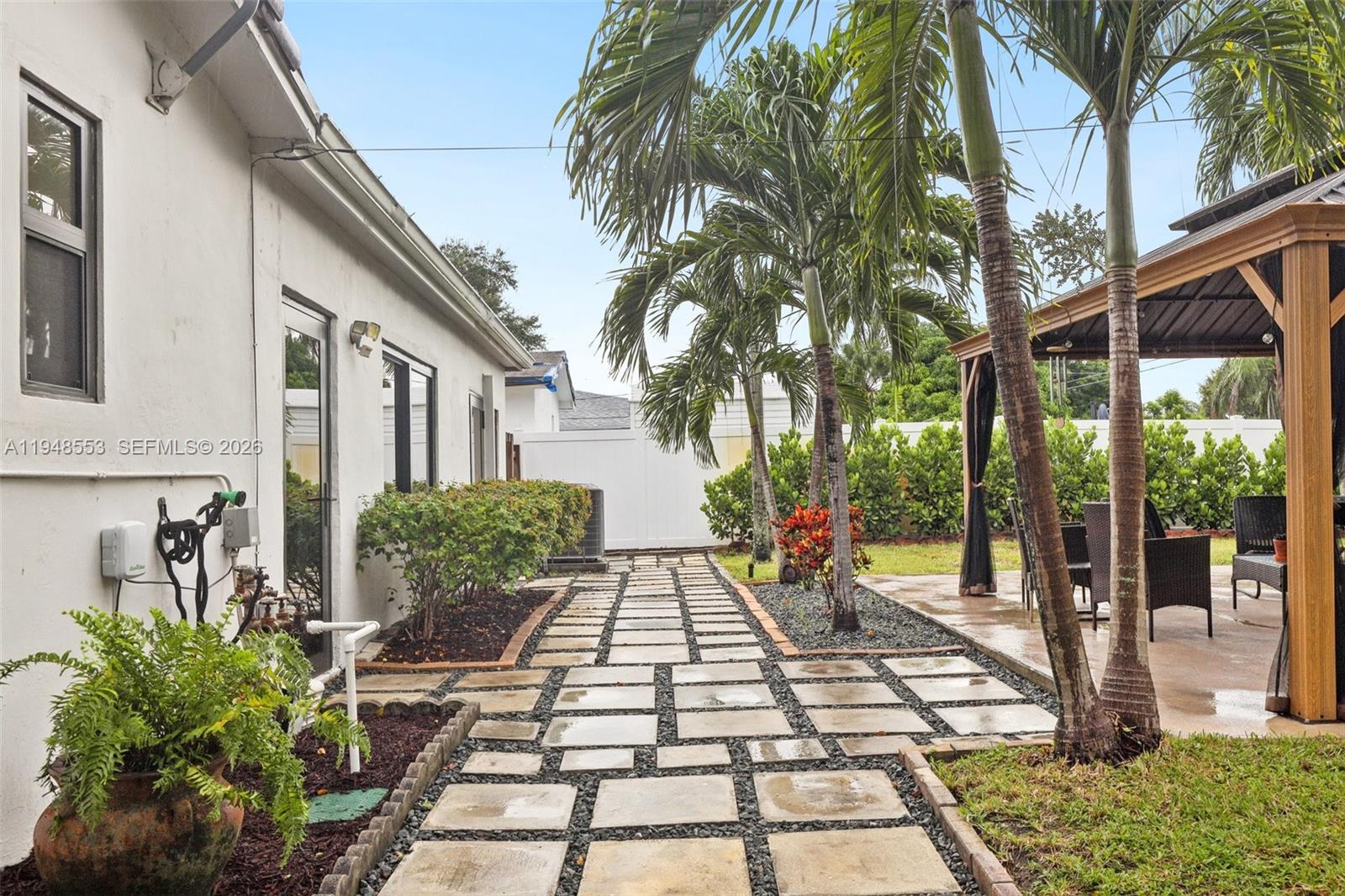 5301 Pierce Street Hollywood, FL 33021 - Photo 45 of 45 a front view of a house with garden