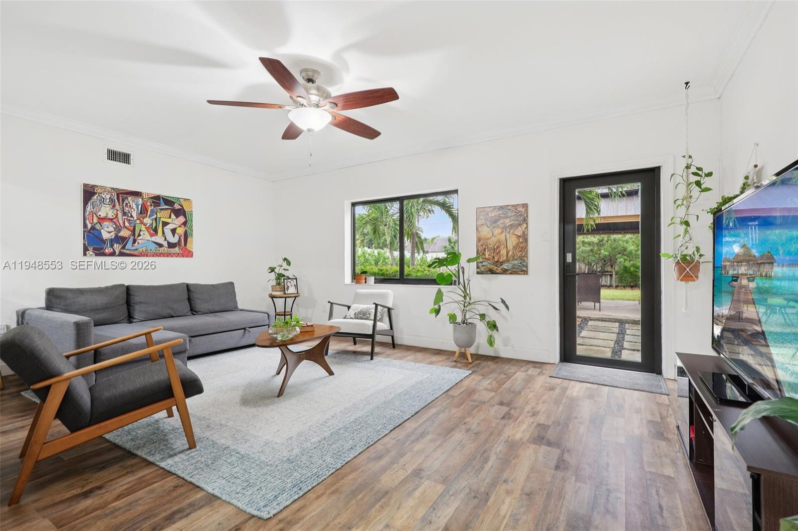 5301 Pierce Street Hollywood, FL 33021 - Photo 8 of 45 a living room with furniture and a window