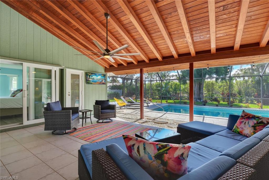 2328 Clipper Way Naples, FL 34104 - Photo 4 of 44 a outdoor space with patio the couches and pool