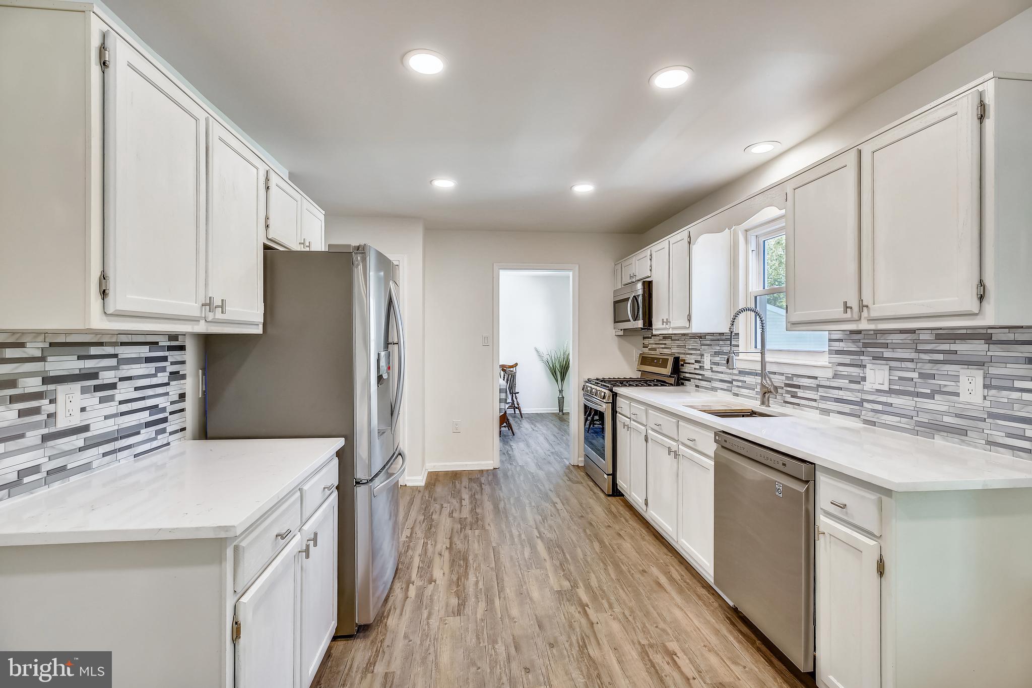 1109 Kersey Road Silver Spring, MD 20902 - Photo 19 of 65 Kitchen with new Quartz counters, recessed lights.