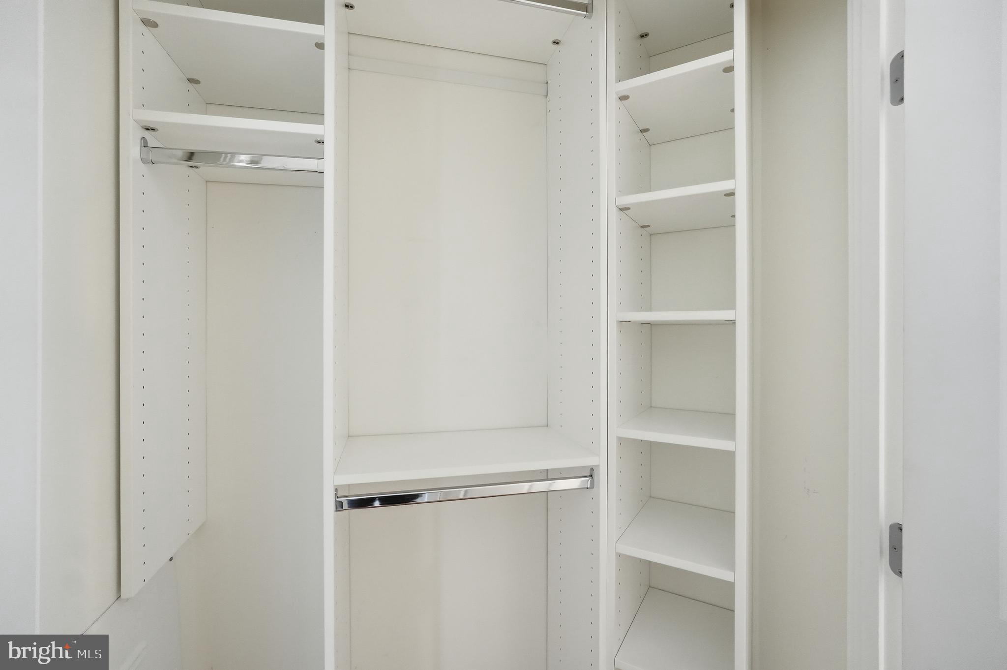 440 L Street Northwest, Unit 805 Washington, DC 20001 - Photo 29 of 38 a view of walk in closet with empty racks