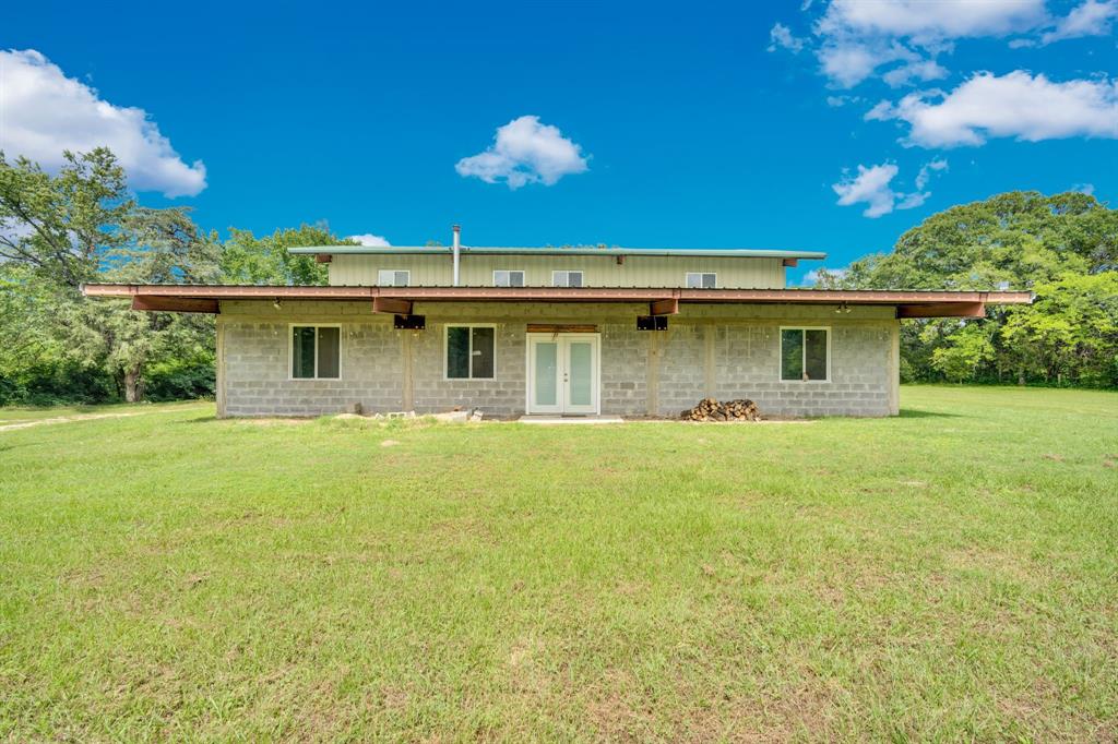 10476 County Road 313 Terrell, TX 75161 - Photo 1 of 40 a view of a house with a backyard