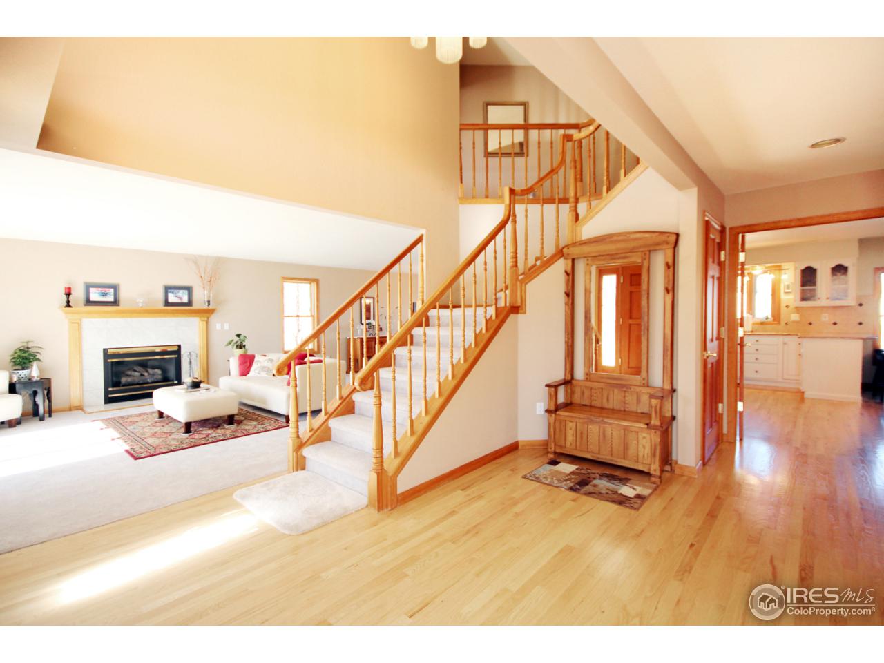 3167 Nelson Road Longmont, CO 80503 - Photo 12 of 25 Stairway to Upper Level