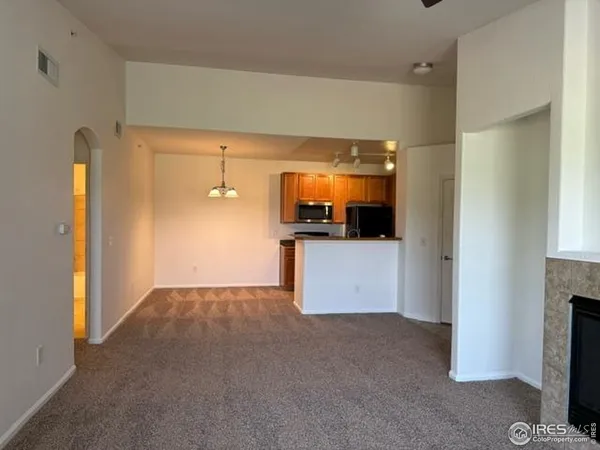 a view of a kitchen with a sink