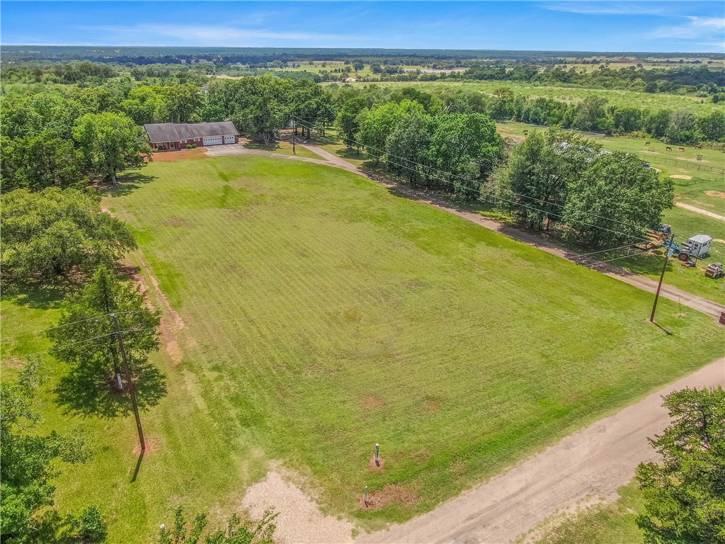 1110 County Road 439 Dime Box, TX 77853 - Photo 3 of 50 a view of a field with an ocean view