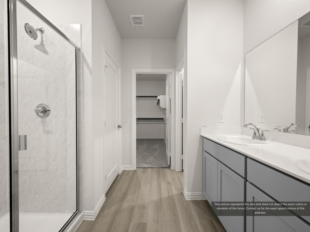 1805 Zelvia Lane Waco, TX 76708 - Photo 13 of 22 a bathroom with a sink and mirror