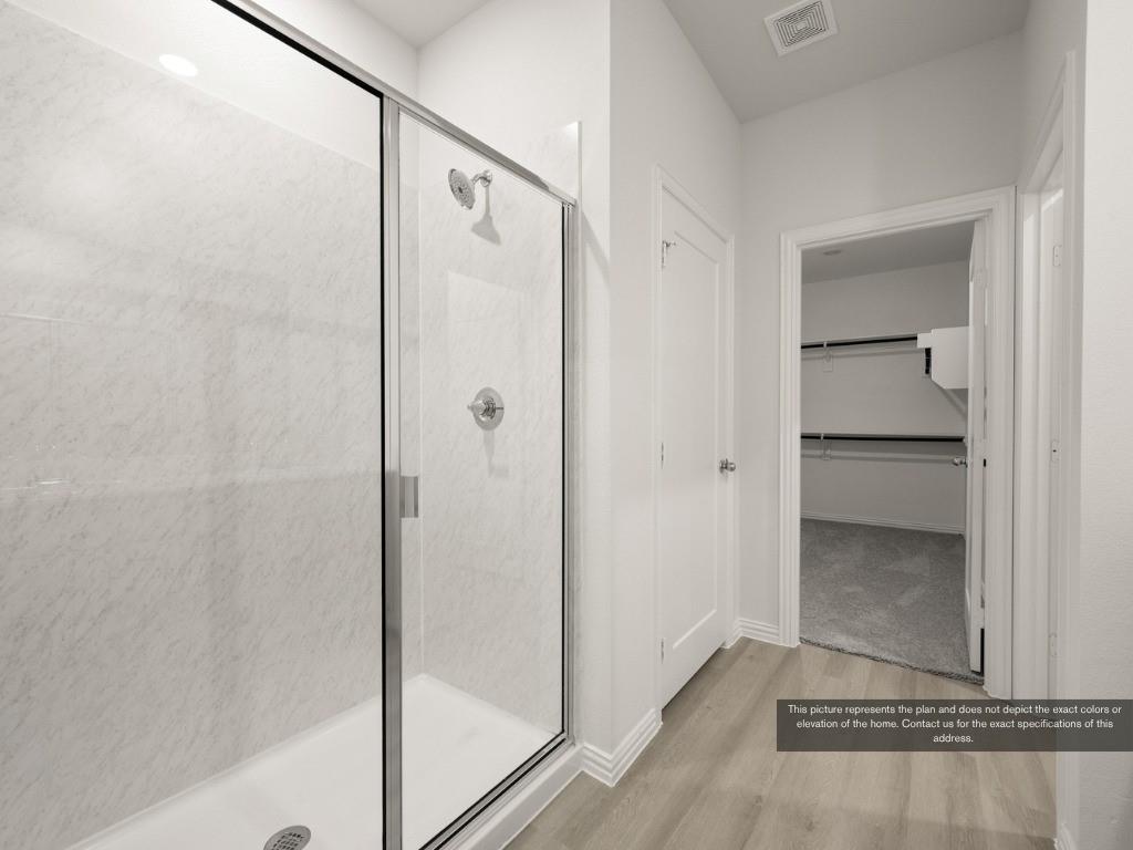 1805 Zelvia Lane Waco, TX 76708 - Photo 14 of 22 a bathroom with a glass shower door