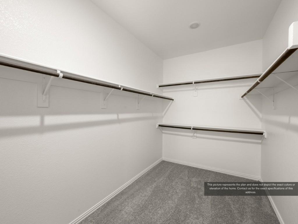 1805 Zelvia Lane Waco, TX 76708 - Photo 16 of 22 a view of a room with racks on the wall