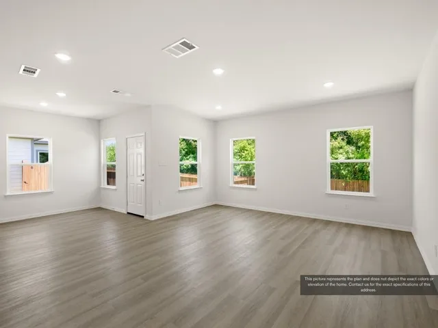 a view of kitchen with wooden floor