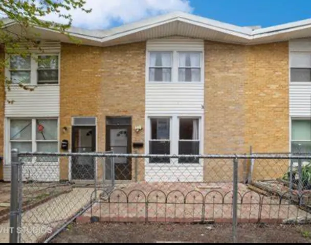 a front view of a house with wooden floor