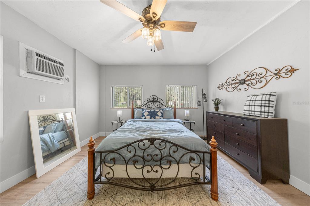 16675 Southwest 143rd Avenue Archer, FL 32618 - Photo 14 of 26 a bedroom with furniture and a window