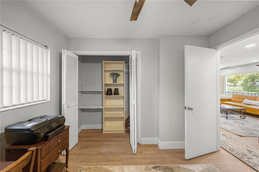 16675 Southwest 143rd Avenue Archer, FL 32618 - Photo 17 of 26 a kitchen with a refrigerator and a stove top oven