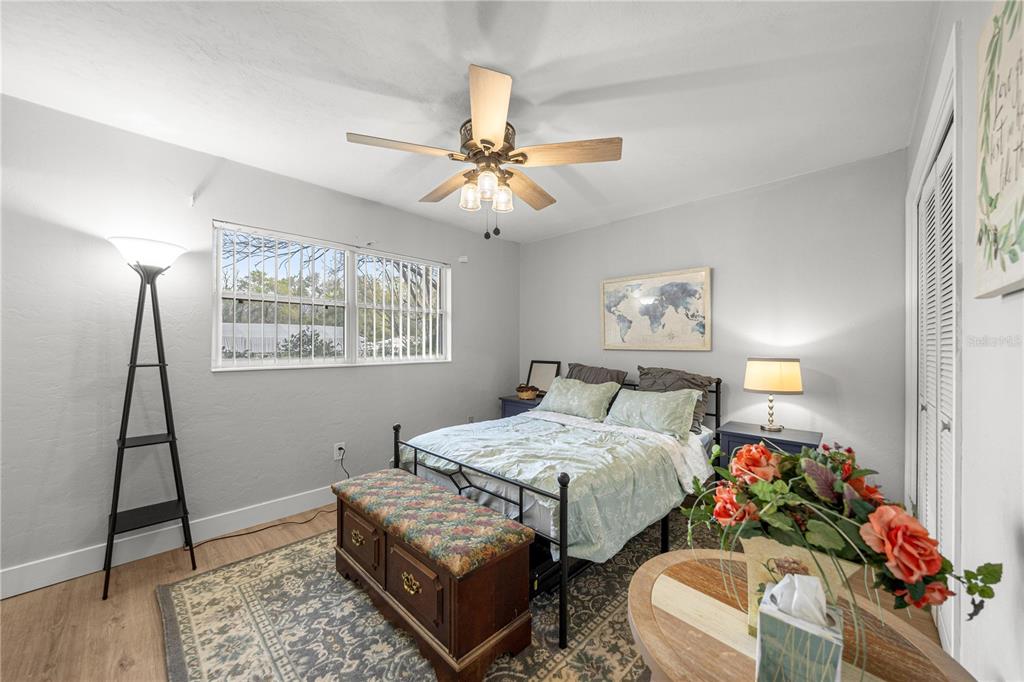 16675 Southwest 143rd Avenue Archer, FL 32618 - Photo 8 of 26 a bedroom with bed and a window