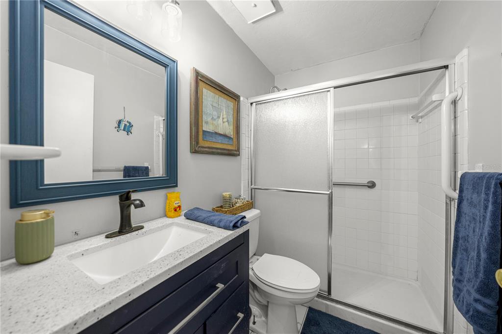 16675 Southwest 143rd Avenue Archer, FL 32618 - Photo 10 of 26 a bathroom with a sink and a mirror
