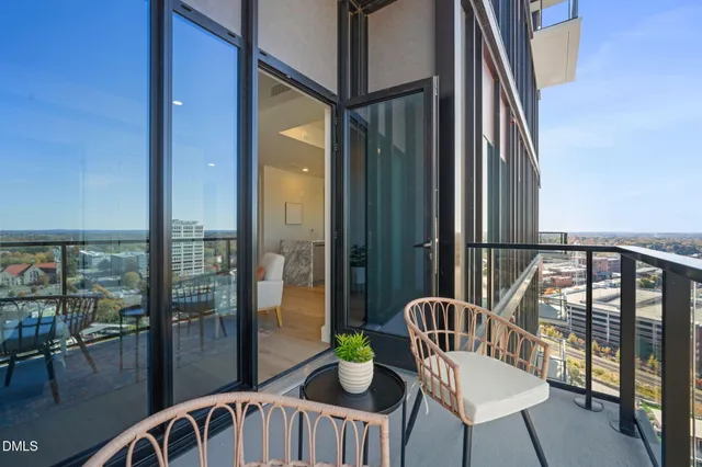 a view of a patio with couches chairs dining table and chairs