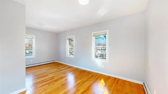 a kitchen with stainless steel appliances a refrigerator and a stove