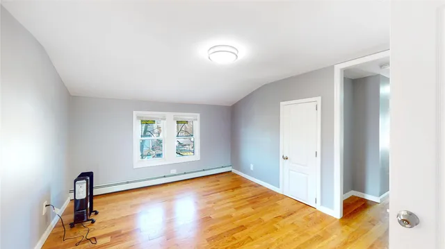 a bathroom with a bathtub and shower
