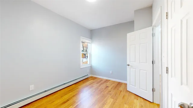 a kitchen with a refrigerator and a sink
