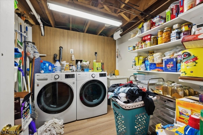 77 Brooklyn Road Stanhope, NJ 07874 - Photo 13 of 21 a utility room with dryer washer and a rug