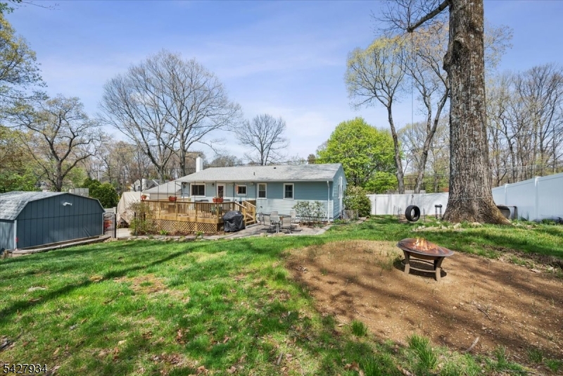 77 Brooklyn Road Stanhope, NJ 07874 - Photo 17 of 21 a front view of a house with garden