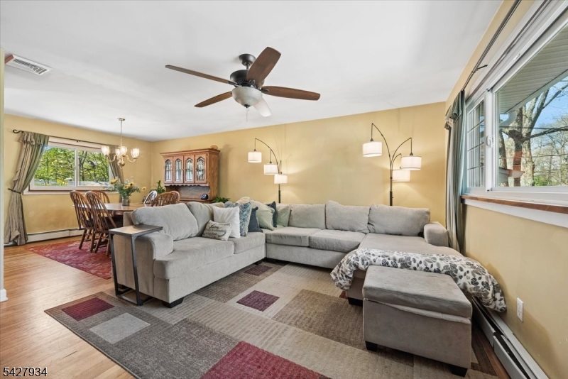 77 Brooklyn Road Stanhope, NJ 07874 - Photo 4 of 21 a living room with furniture and a large window