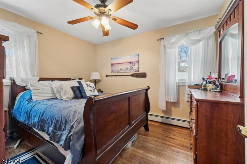 77 Brooklyn Road Stanhope, NJ 07874 - Photo 6 of 21 a bed room with bed and window