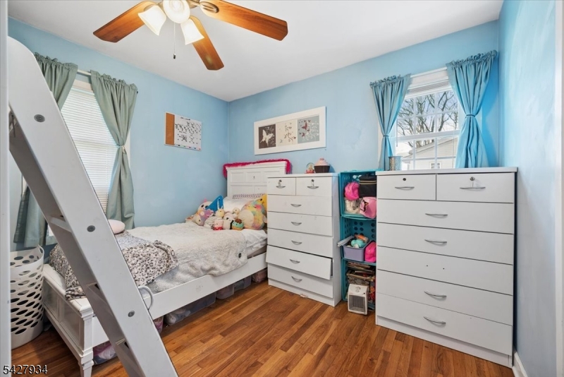 77 Brooklyn Road Stanhope, NJ 07874 - Photo 7 of 21 a bedroom with a bed and furniture