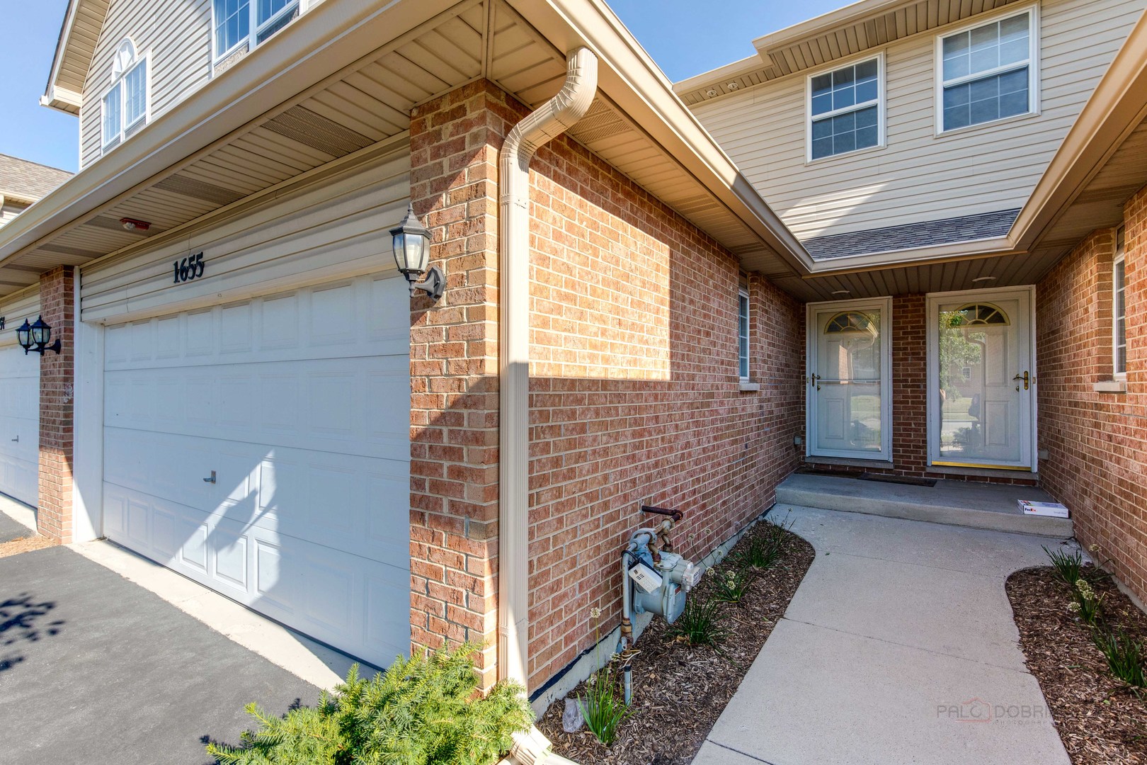 1655 Windward Court Naperville, IL 60563 - Photo 4 of 34 a view of house with backyard and outdoor seating
