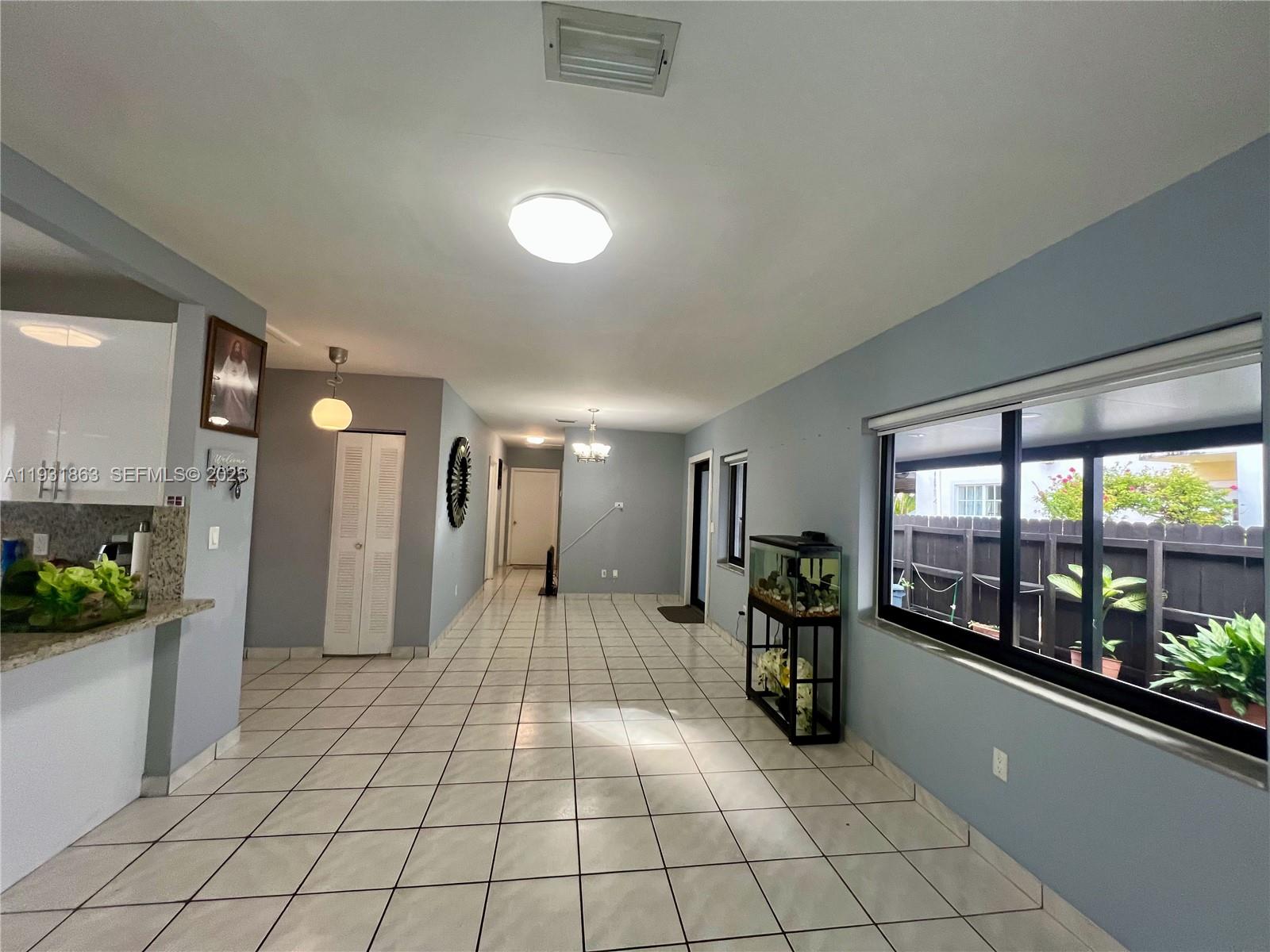 3297-3299 Southwest 26th Street Miami, FL 33133 - Photo 11 of 45 a very nice looking room with a large window