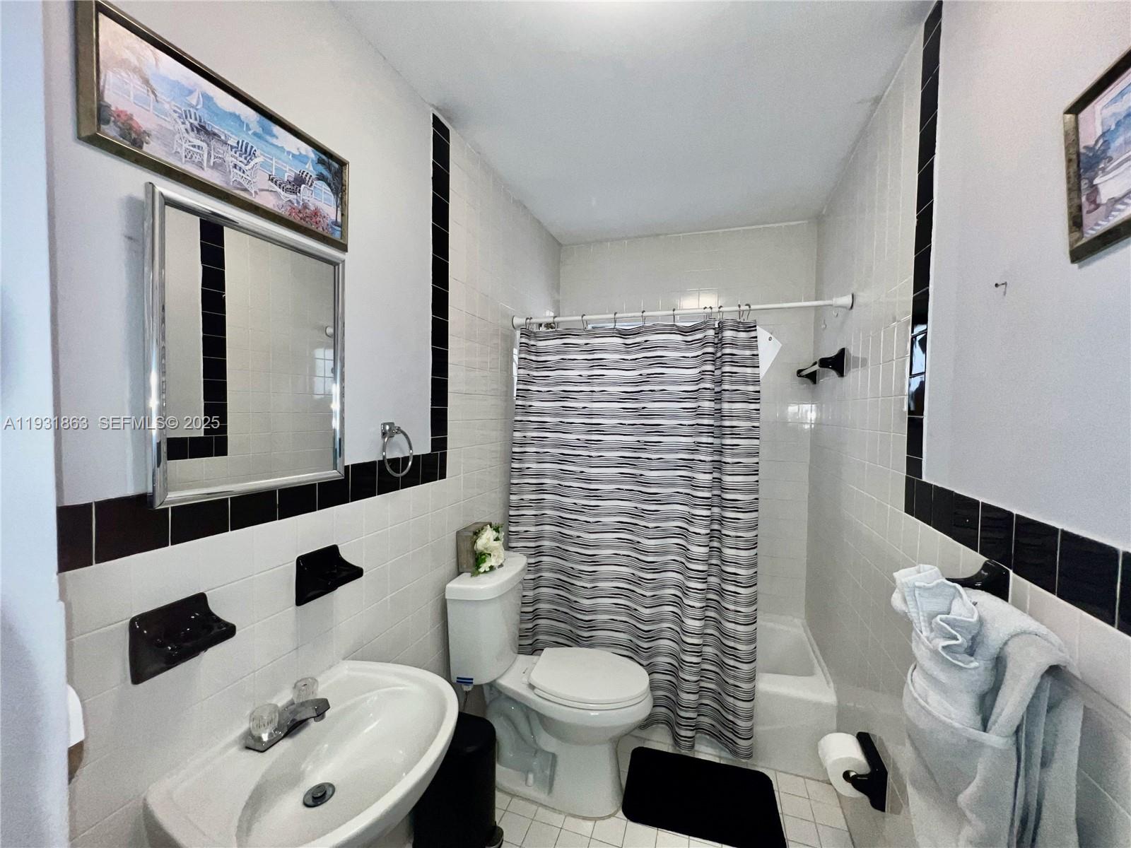 3297-3299 Southwest 26th Street Miami, FL 33133 - Photo 26 of 45 a bathroom with a toilet a sink and a shower