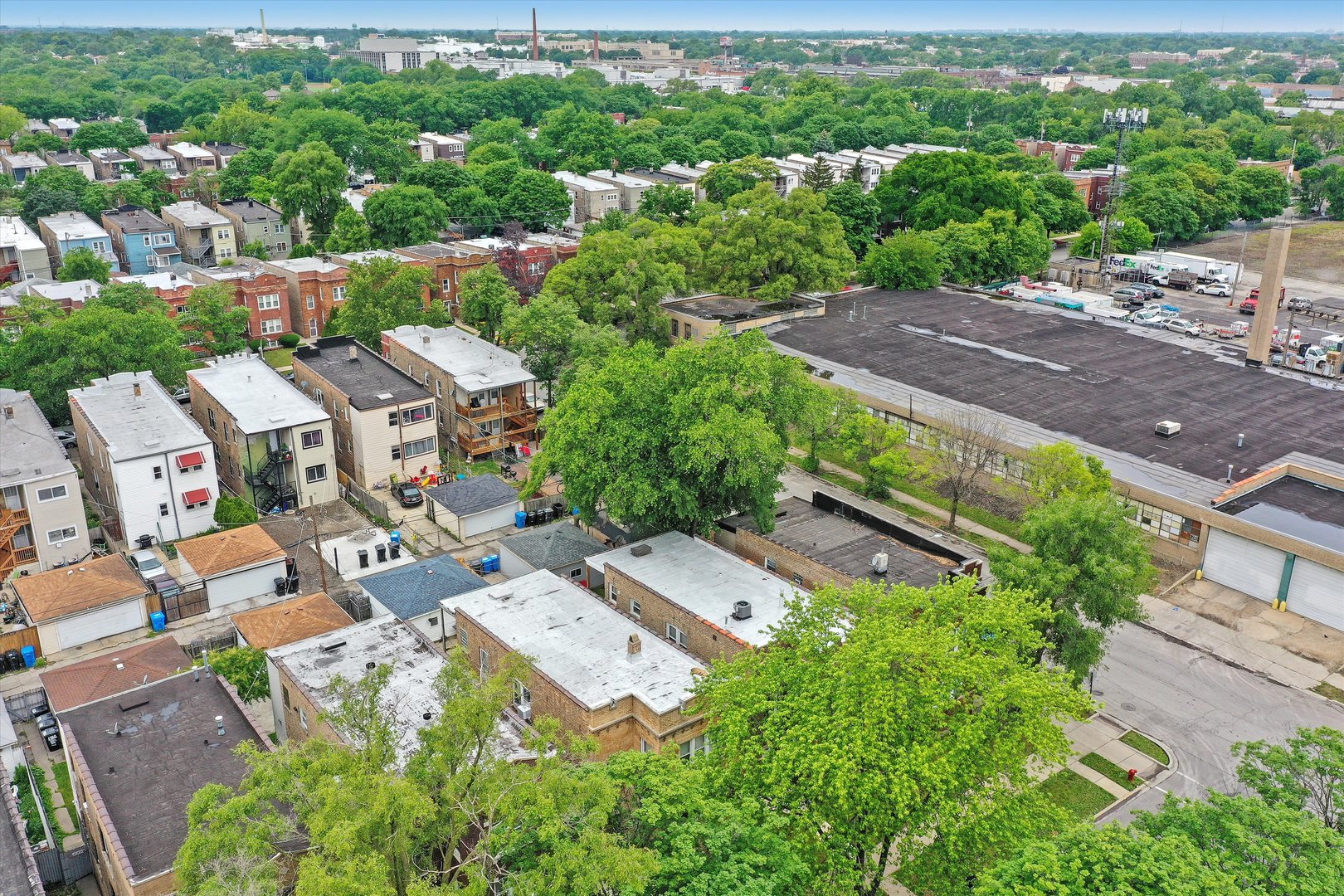 1738 North Menard Avenue Chicago, IL 60639 - Photo 7 of 9 an aerial view of multiple houses with yard